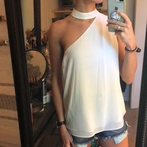 One shoulder white top